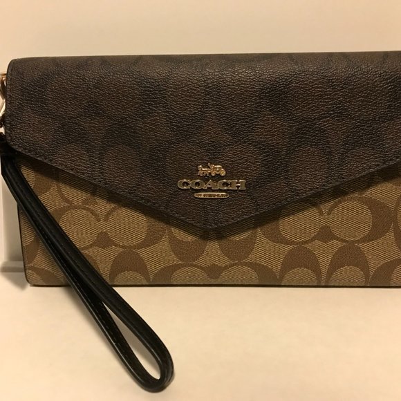 Coach Accessories Coach Travel Envelope Wallet In Blocked Signature